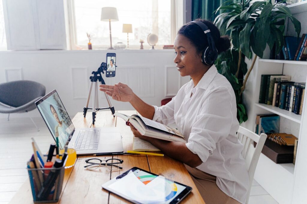 Woman  Talking to a Person on Laptop